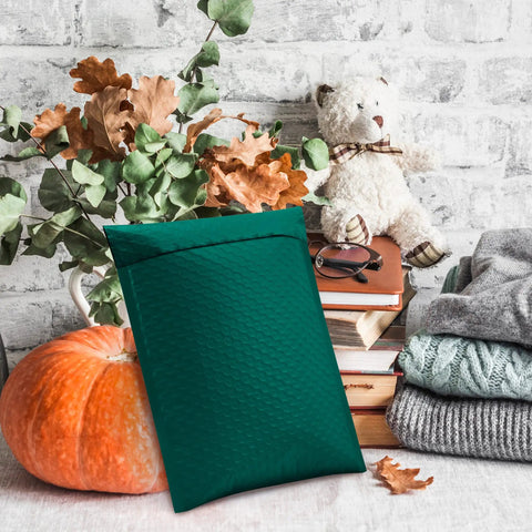 Green Bubble Mailers 12x16 Inch 40 Pack Padded Envelopes with 12x15 Inch Usable Size on autumn-themed background