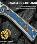Dope Damascus Inlaid G10 EDC Pocket Knife With 3.4 Inch 14C28N Blade, Compound Grind, High Performance Folding Knife For Everyday Carry, Standout Craft And Modern Rugged Style, blue inlaid handle close-up