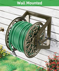 Heavy Duty Garden Hose Reel With Wall And Floor Mount Decorative Hose Holder And Winder For Outdoor Storage Built Tough Steel Construction Holds 200 Feet Of Five Eighths Inch Hose Not Included Keeps Yard Neat And Tidy mounted on wall