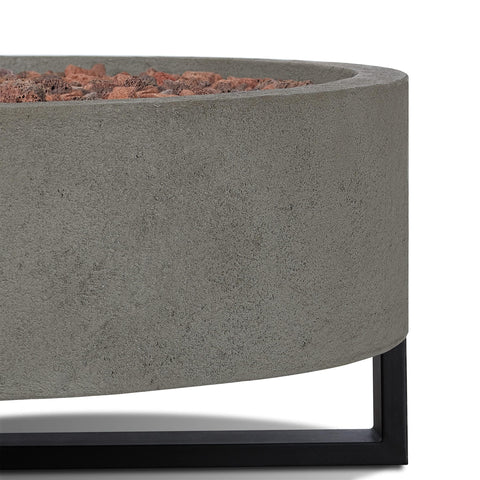 Close-up of the Contemporary Propane Fire Bowl 40x40 Inch Round Glacier Gray Finish with lava rocks and metal base.