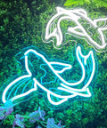 Koi Fish Neon Sign Ice Blue And White LED Light Art, 14 Inch Acrylic Flex Neon, 3D signage on leafy background.