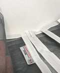 Close-up of a white Magnetic Fiberglass Door Screen For Patio And Front Doors, 72x80 Inch Fit, showing mesh and self-sealing closure.