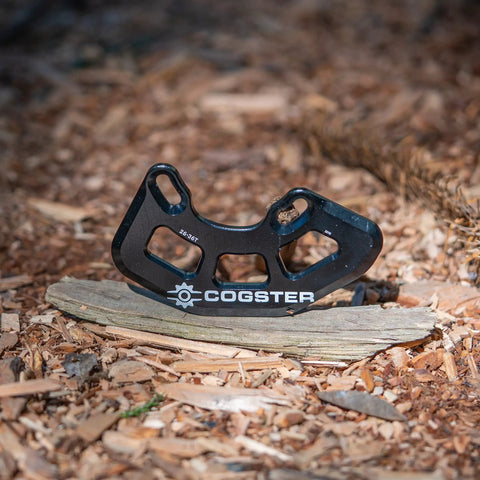 FortiGuard Alloy MTB Bash Guard ISCG05 Compatible For 26T To 36T Chainrings on forest floor, black CNC-machined alloy