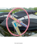 Heavy Duty Brake Winch 1200 Lb Capacity, Rust-Resistant TUFFPLATE, mounted on dock near watercraft, pink handle visible