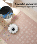 Matrix Clean Robot Vacuum With Serious Suction For Pet Hair On Carpets And Hard Floors Self Empty Base shown cleaning confetti on rug