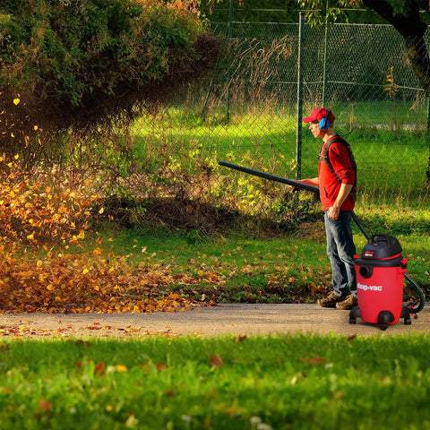 Man using Heavy Duty 6 Gallon Wet Dry Vacuum With 3.0 Peak HP, 3 In 1 Function, Dual Flex Hose, Built In Blower Port outdoors