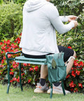 Person using Garden Kneeler Seat With EVA Foam Pad, Folding Portable Stool And Kneeling Pad, Steel Tubing Build, Tool Pouch, Green.