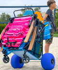 Heavy Duty Folding Beach Cart With Balloon Wheels Ocean Utility Carrier For The Sand 13 Inch By 7 Inch Sand Wheels in use