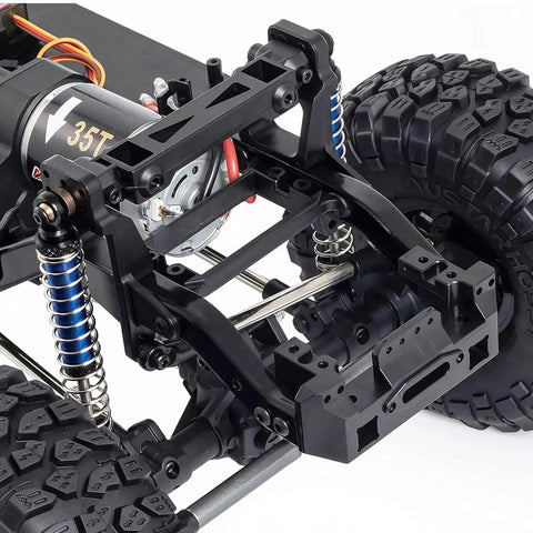 Close-up of One Tenth Scale RC Crawler Chassis Kit With 313mm Wheelbase, showing nylon frame, 35T motor, and axles.
