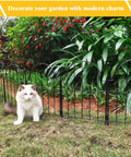 Arch Garden Fence Panels 22 Inch High No Dig Rustproof Metal Fence with ground stakes set up in a garden with a white cat.