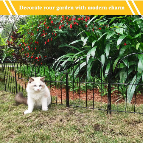 Arch Garden Fence Panels 22 Inch High No Dig Rustproof Metal Fence with ground stakes set up in a garden with a white cat.