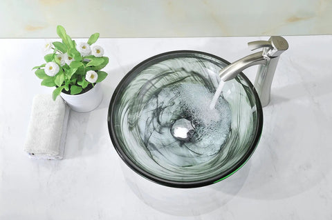 Mezzo Slumber Wisp Sleek Tempered Glass Vessel Sink Bowl In Grey Finish with water flowing from faucet