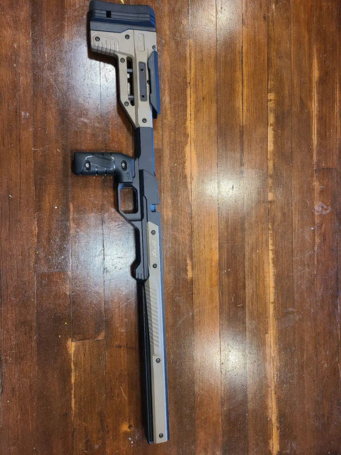 Oryx Sportsman Tika T1X SA Right Hand Chassis System Black Rifle Stock With Custom Length Of Pull Accessory on wood floor