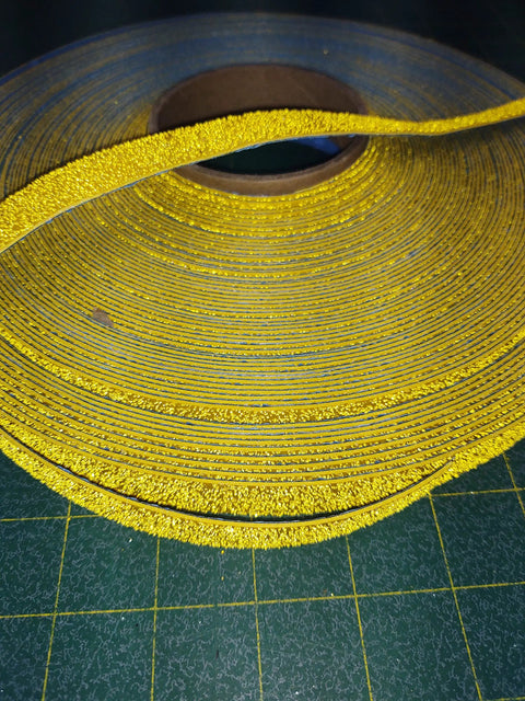 Roll of slip resistant sensory path and safety tape for outdoors, heavy duty rubber base, yellow reflective pavement marking tape RPT 750, 1 inch by 36 inch, weatherproof durable roadway markings.
