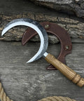 Hand Forged Athame Crescent Blade Sickle For Ritual Work And Herb Harvesting A Versatile Witchy Tool on wood