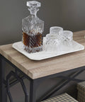 Top Shelf Modern Industrial Console Table 43 Inch For Entryway And Hallway Thick Wood Heavy Duty Steel Frame Spacious Storage Shelf Durable Base Living Room Accent Sofa Table Rustic White Oak with decanter and glasses on top.