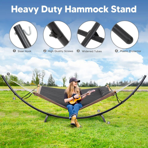 Person sitting on Portable Standing Patio Hammock With Foldable Steel Stand, Heavy Duty Frame Supports Up To 475 Lbs For 2 To 3 People