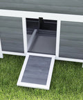 Close-up of Wooden Chicken Coop 39 Inch with Nesting Box and Pull Out Tray, waterproof roof, outdoor hen house for 2 to 4 chickens, light gray.