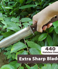 Person holding Hori Hori Garden Knife with leather sheath and handguard Pro Grade 440 stainless steel blade in garden