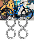 4 Pack Bicycle Ball Bearing Retainers 29.5mm Outer Diameter 19mm Inner Diameter With 9 Balls For Crank Mid Axle And Wheel Hub Bearings Durable Steel Cage For Smooth Rolling And Long Lasting Performance shown with mountain bike and graffiti wall.