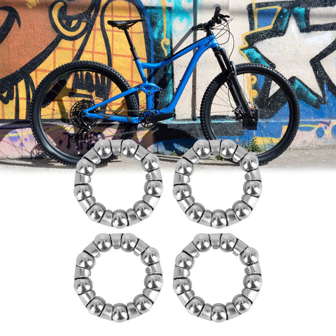4 Pack Bicycle Ball Bearing Retainers 29.5mm Outer Diameter 19mm Inner Diameter With 9 Balls For Crank Mid Axle And Wheel Hub Bearings Durable Steel Cage For Smooth Rolling And Long Lasting Performance shown with mountain bike and graffiti wall.