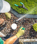 Person using Sprinkler Head Tool Set for Rain Bird Irrigation Systems, Pull Up and Rotor Adjustment Tools on lawn sprinkler