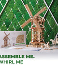 Tower Windmill 3D Puzzle Kit For Adults With Moving Parts Wooden Mechanical Model Building Kit DIY Craft Project For Fathers Day Mind Blown Wood Puzzle 585 Pieces displayed with box and tools on table.