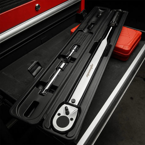 Half Inch Drive Click Torque Wrench 25-250 Ft-Lb Range with Dual Scale in black storage case on workbench