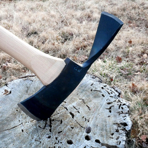 Pulaski Style Wildfire Axe With 3.75 Lb Forged Steel Head And 36 Inch Hickory Handle embedded in tree stump