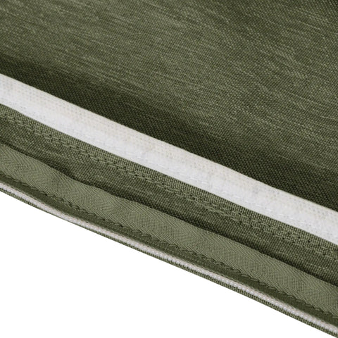Close-up of Montlake FadeSafe Outdoor Bench Cushion fabric in Heather Fern, showing water-resistant, fade-resistant features.