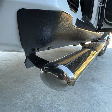 Trail Armor Rocker Panel Cover installed on Dodge Ram Crew Cab 2009-2018, showing matte black finish under door protection.