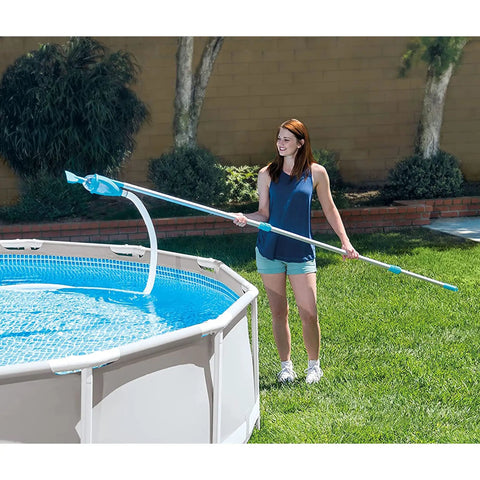 Woman using Deluxe Above Ground Pool Maintenance Kit With Vacuum For 800 GPH Flow Rate 110 Inch Telescoping Pole Wall Brush cleaning pool