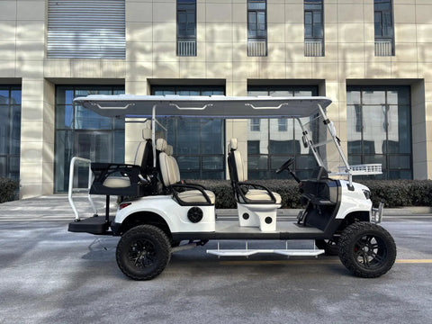 Rock Solid 6 Seater Electric Golf Cart With 48V Lithium Battery And 14 Inch Off Road Tires White profile view on pavement.