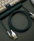 Pro Grade USB A To USB C Spiral Keyboard Cable 1.8M Dark Green Wear Resistant Braided Sheath Aviation Style Plug High Speed Data Transfer For Mechanical Keyboards 8KHz Magnetic Axis Return Ready, coiled on desk