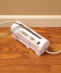Expandable Power Strip Cover For Baby Proofing Keeps Outlets Covered And Cords In Check No More Cord Pulls on wooden floor