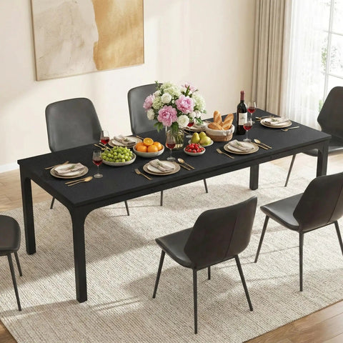 Extra Long Dining Table With Badass Steel Legs, Rectangle Kitchen Table And Dinner Spot Seats The Whole Squad Comfortably, modern black wood top with a floral centerpiece and dining setup.