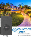 300W Low Voltage Landscape Lighting Transformer with Timer and Photocell in garden setting with countdown timer display