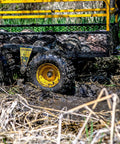 Beefy Heavy Duty Utility Trailer With Tandem Walking Arm For Rough Terrain Military Grade Steel Mesh Cargo Basket in muddy field