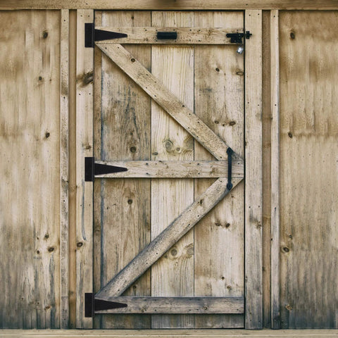 Wooden barn door with 10 Inch T Strap Heavy Duty Door Hinges Black Tee Hinge For Wood Fences Gardens Barn Doors And Gates Rustproof 1/8 Inch Thick Steel.