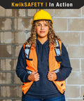 High Visibility Womens Safety Vest Class 2 Reflective Construction Workwear Yellow Medium featuring utility pockets worn by a woman on site.