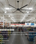 Straight Up 144 Inch HVLS Industrial Ceiling Fan Built Tough With 130W DC Motor Six Reversible Aluminum Blades Plus Smart Remote Control For Workshops Barns Warehouses And Big Commercial Spaces in matte black, suspended in a warehouse.