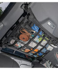 Overhead Car Cargo Net With 3 Pockets For Extra Roof Storage On Road Trips And Camping Durable Mesh Organizer installed in SUV interior