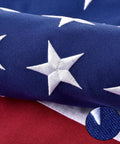 Close-up of embroidered stars on Outdoor 3x5 Foot American Flag Built Tough Deluxe Heavy Duty Spun Polyester Tear Resistant Waterproof All Weather High Wind USA Flag With Embroidered Stars Sewn Stripes Brass Grommets.