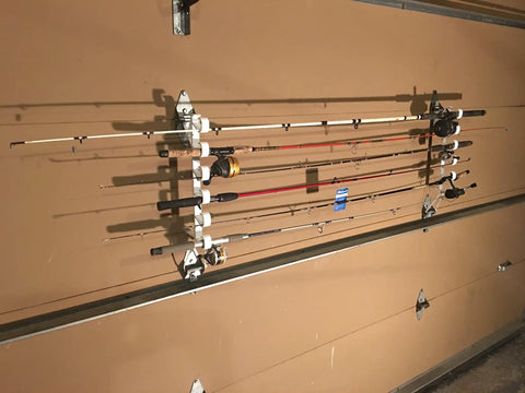 Easy Clip Garage Door Storage Rack With Hooks For Fishing Rods Kayak Paddles And Light Garden Tools Installs In Seconds No Tools Needed Clips To Garage Door Hinge Tubes For Quick No Fuss Organization holding fishing rods on garage door
