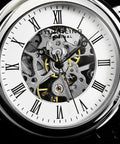 Close-up of dual-sided dial on Men's Skeleton Pocket Watch With Hand Wind Mechanical Movement Stainless Steel Case And 12 Inch Chain With Belt Clip Dual Sided Dial With Roman Numerals Krysterna Crystal Old School Analog Timepiece.