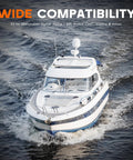 White motor yacht on dark blue ocean with wake; large orange WIDE COMPATIBILITY text across the top.