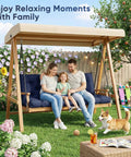 Family sitting on 60 Inch Waterproof Porch Swing Cushions For 2 To 3 Seaters in garden with dog, enjoying outdoor time.