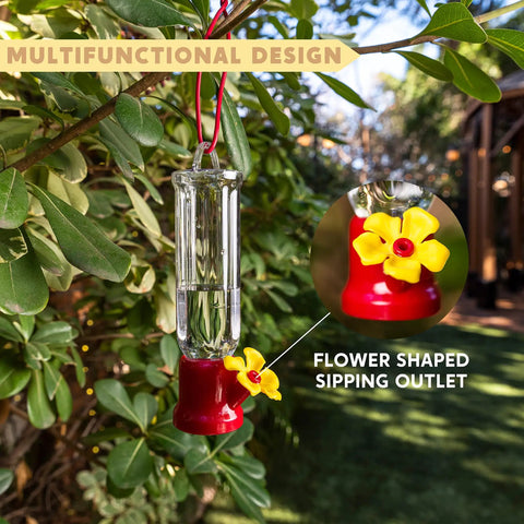 Set Of 6 Mini Hummingbird Feeders With Hanging Wires, Transparent Outdoor Hummingbird Feeder Set With Flower Shaped Sipping Outlet, Includes 3 Cleaning Brushes For Easy Cleaning On Patio, Lawn, Garden And Backyard, hanging on a tree branch showing flower-shaped sipping outlet close-up.