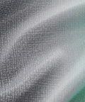 Close-up of Blackout Curtain Panel For Bedroom And Kids Room With Sheer Layer and Laser Cutout Star Design Rainbow Unicorn Decor 34 by 63 Inches One Panel Room Darkening Window Curtain For Nap Time And Night fabric texture.
