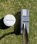 Hellcat ZT Putter with Zero Torque design keeps face square 34 inch right handed next to golf ball on green